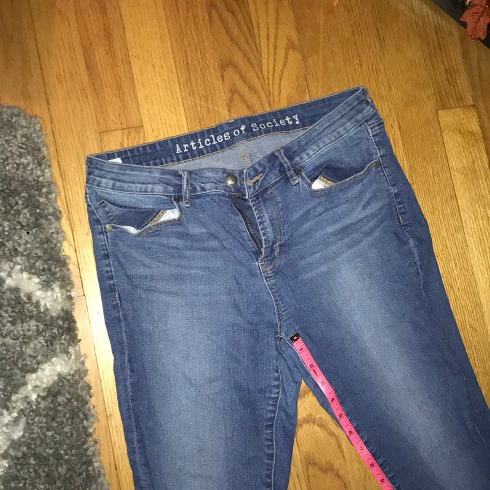Articles of society ripped knee jeans.